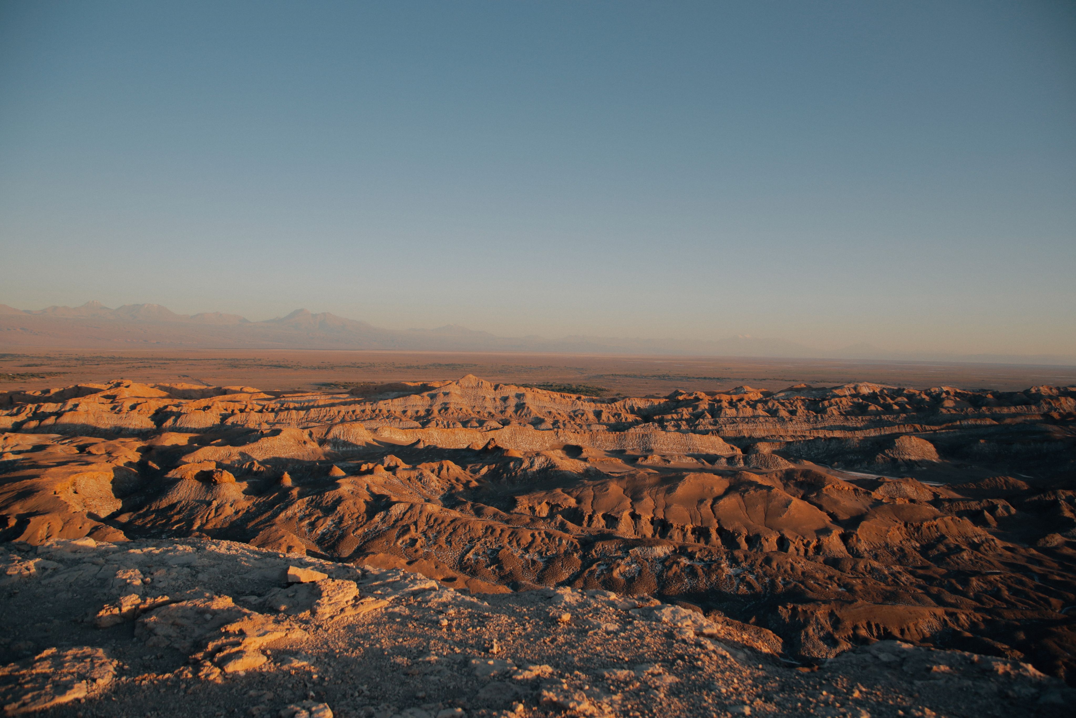 Desert plains beneath a blue sky